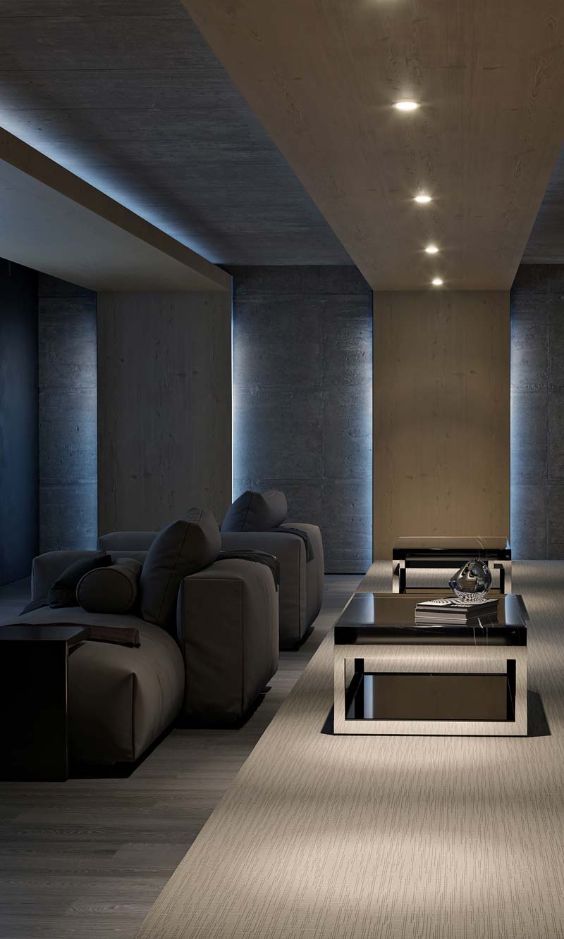 Red toned home theater with acoustical treatments on the walls