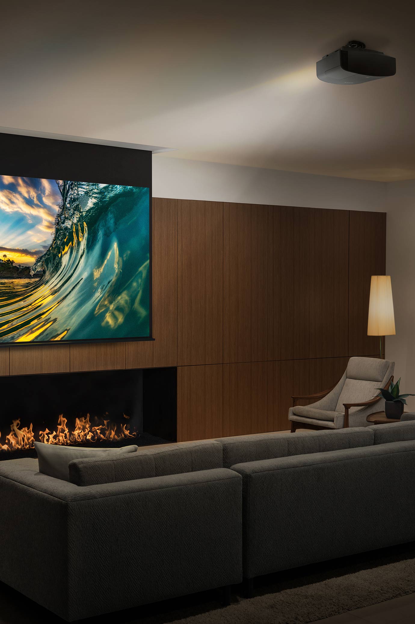Sony media room with wooden walls and a fireplace