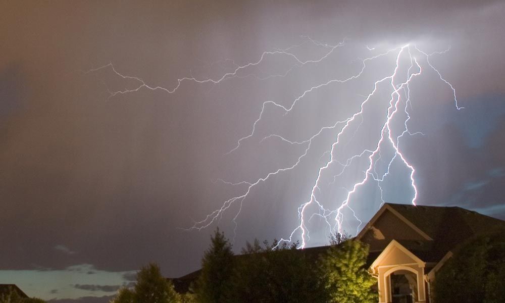 Stewart Filmscreen Corporation home theater with white walls and LED lighting