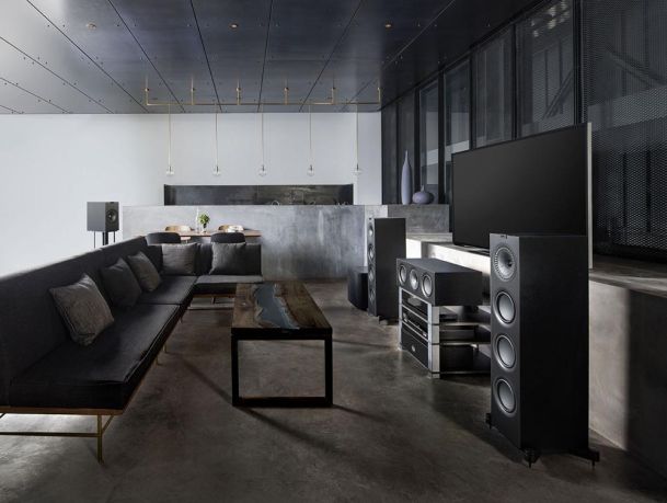 Black kef speakers in modern living room